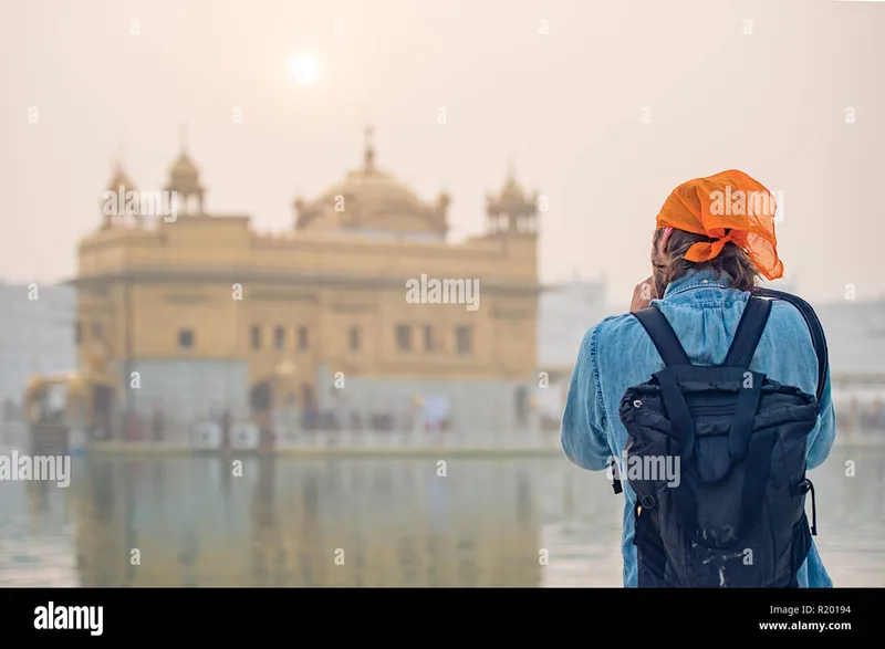 Image Amritsar - Golden Temple image beautiful image beautiful image beautiful image beautiful image beautiful image beautiful image beautiful - A tourist with an orange bandana is taking a picture at the ...