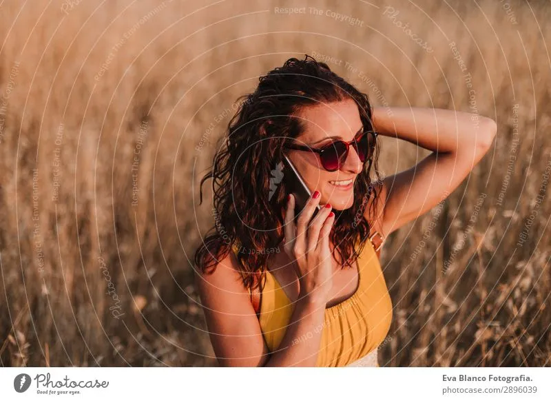 Image Blanco Brown image beautiful image beautiful image beautiful image beautiful - Young beautiful woman in yellow dress taking a selfie - a Royalty ...