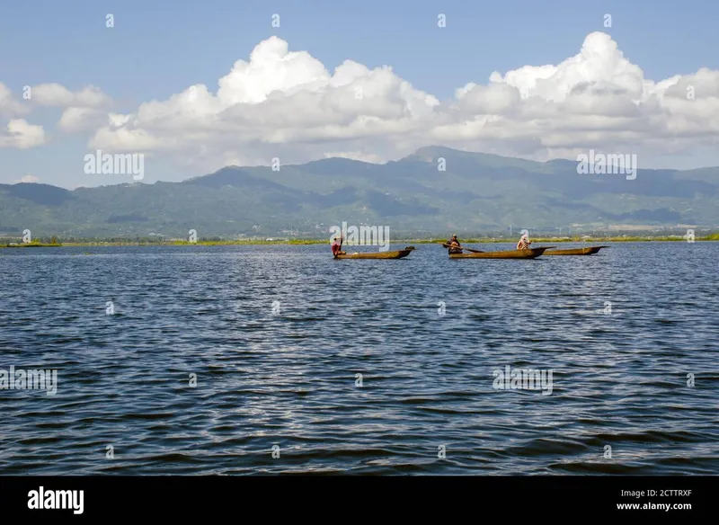 Image Imphal - Loktak Lake image beautiful image beautiful image beautiful - Three fishermens are sailing through the beautiful Loktak Lake ...