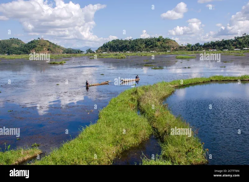 Image Imphal - Loktak Lake image beautiful image beautiful image beautiful - Two fishermen are sailing through the beautiful Loktak Lake ...