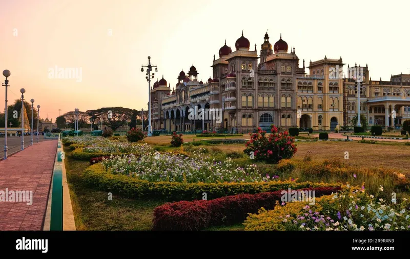 Image Mysore - Mysore Palace image beautiful - A scenic view of Mysore Palace with beautiful flowers in its ...