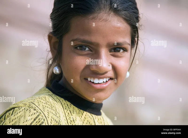 Image Varanasi - The Holy City image beautiful - A young girl at the Ganges riverside in the Hindu holy city of ...