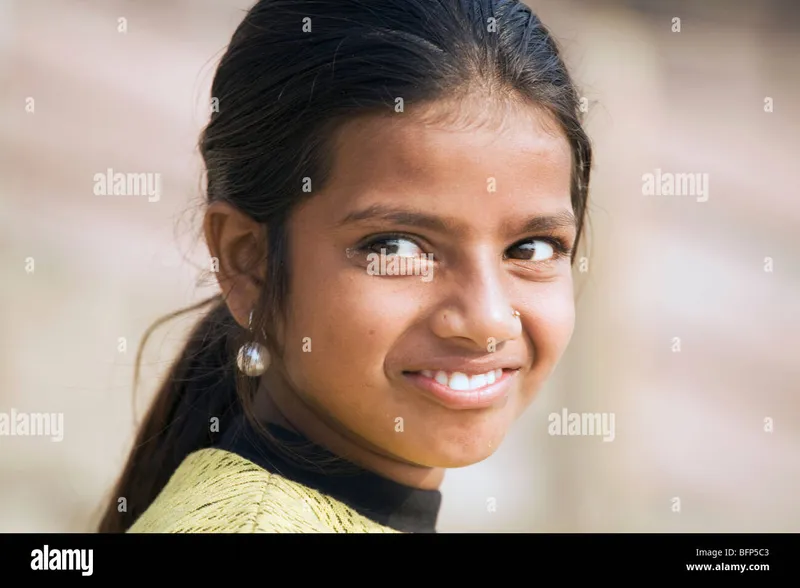 Image Varanasi - The Holy City image beautiful - A young girl at the Ganges riverside in the Hindu holy city of ...