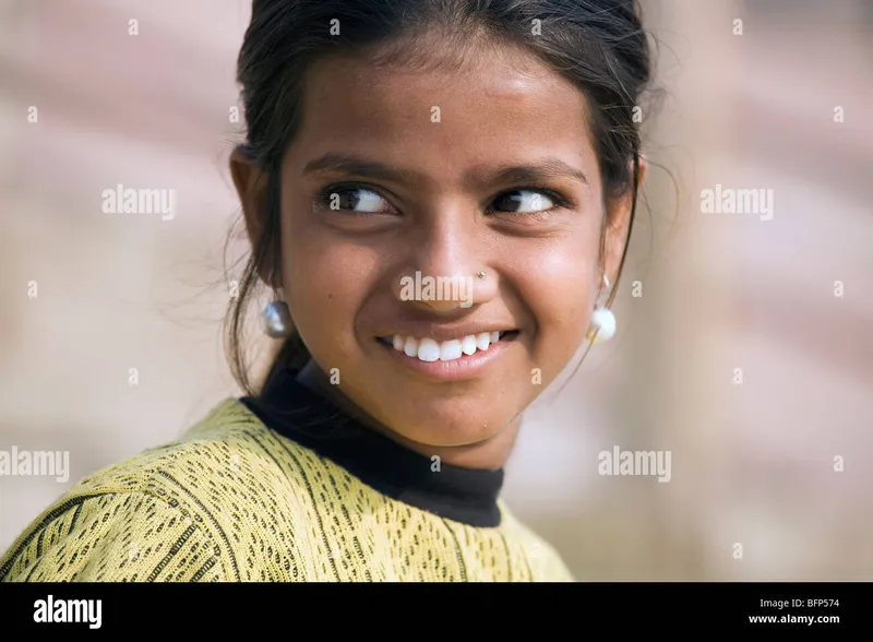 Image Varanasi - The Holy City image beautiful - A young girl at the Ganges riverside in the Hindu holy city of ...